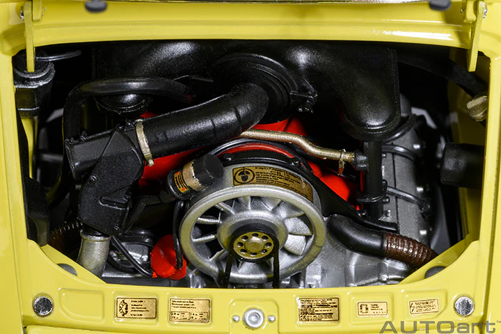 AUTOart Porsche 911 Carrera 2.7 RS Light Yellow w/ Green Deco and Wheels 1:18 - Image 13