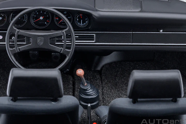 AUTOart Porsche 911 Carrera 2.7 RS Light Yellow w/ Green Deco and Wheels 1:18 - Image 16